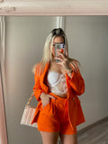 Completo giacca e short arancio