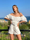 Tutina bianca scollo a barchetta e pizzo