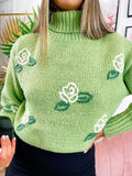 Maglione collo alto con rose verde