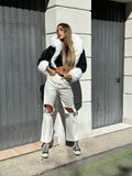 Jeans bianco con strappo