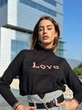 Pull nero e rosa