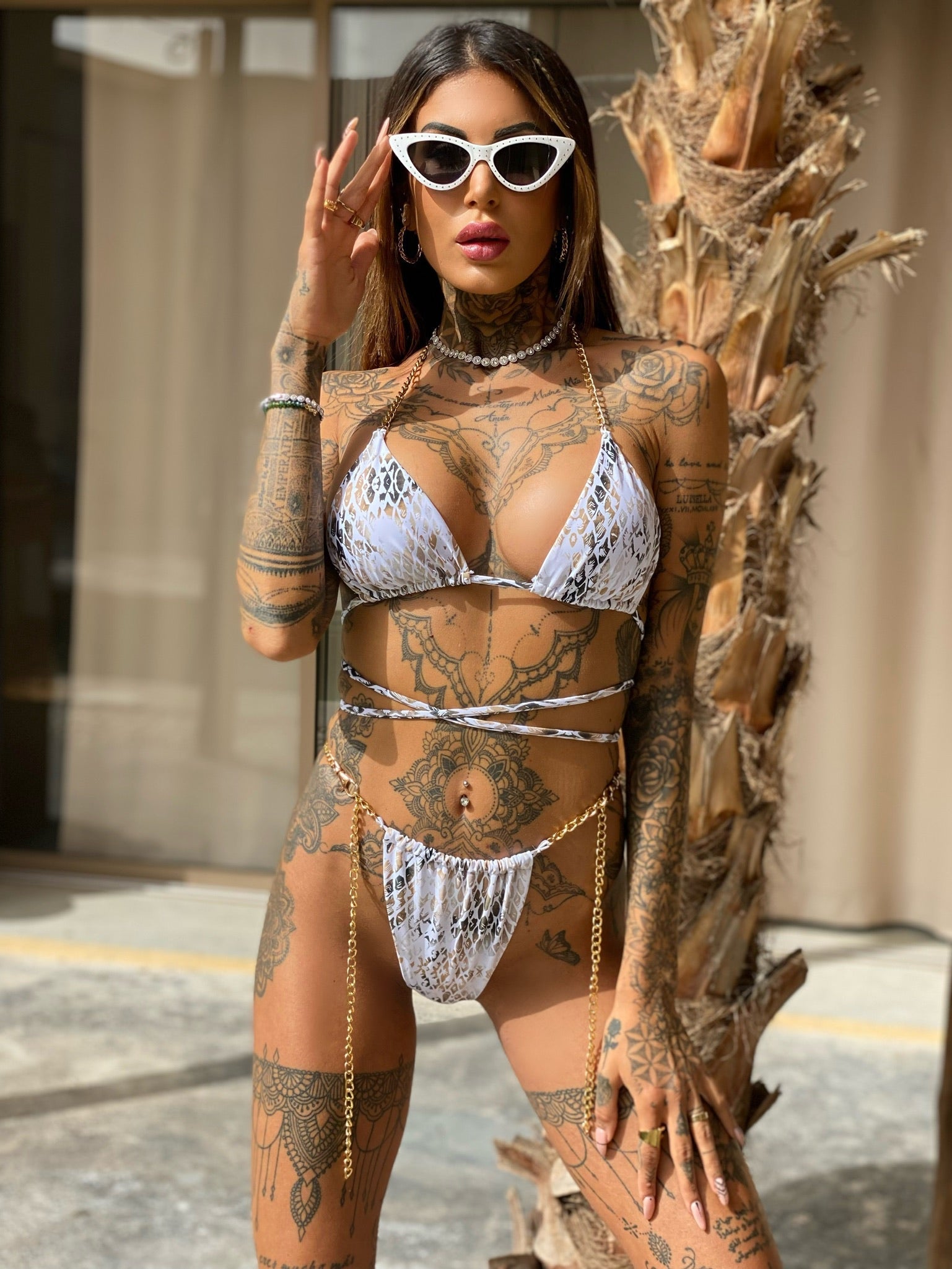 Bikini pitonato con catena