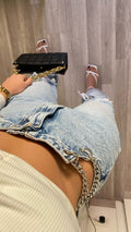 Jeans con catena argento