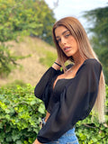 Blusa con scollo a V maniche velate