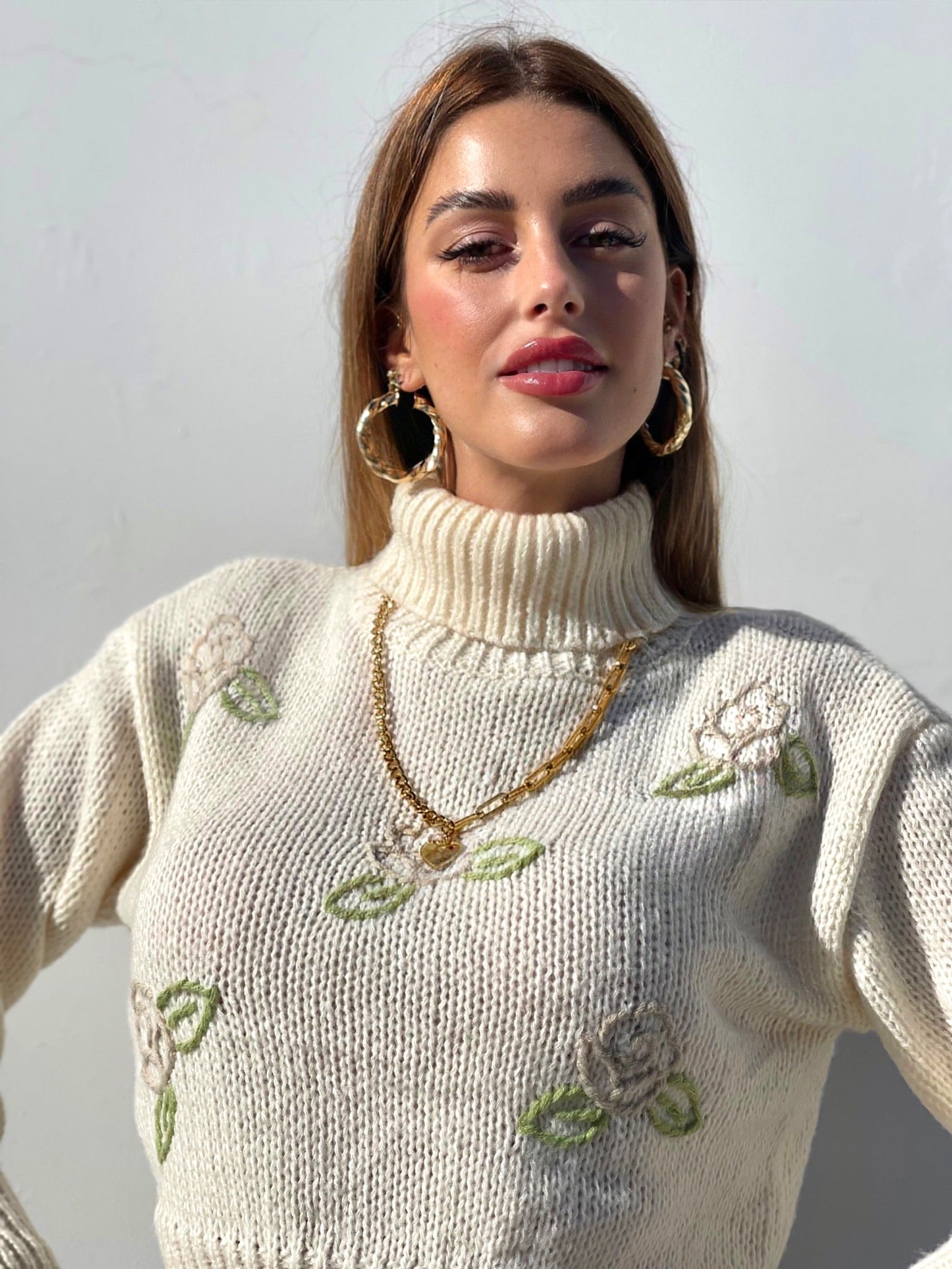 Maglione collo alto con rose Panna