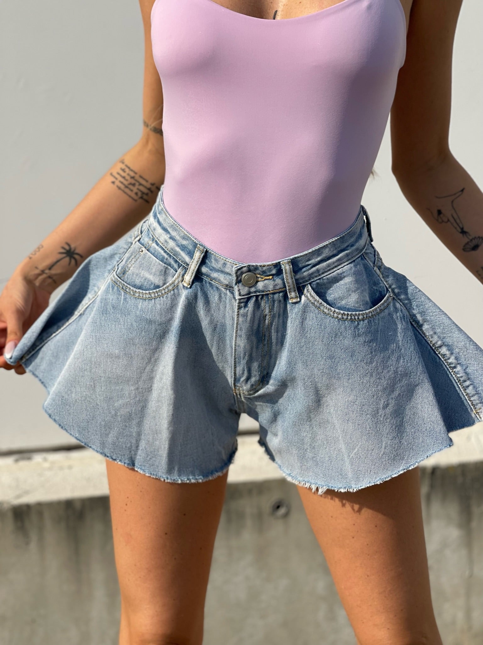 Short in jeans a farfalla