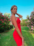 Abito aderente rosso schiena incrociata