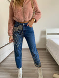 Jeans con borchie