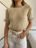 Maglioncino crop beige con piume