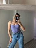Top lilla con anelli oro