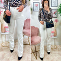 Jeans aderente bianco con zampa