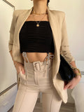 Completo giacca e pantalone beige