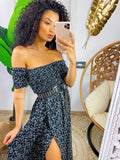 Abito lungo con scollo a barchetta con pois nero