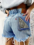 Short Levi’s Vintage bagno chiaro con borchie