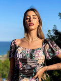 Abito a fiori nero manica corta