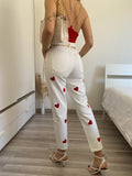 Jeans bianco cuori rossi