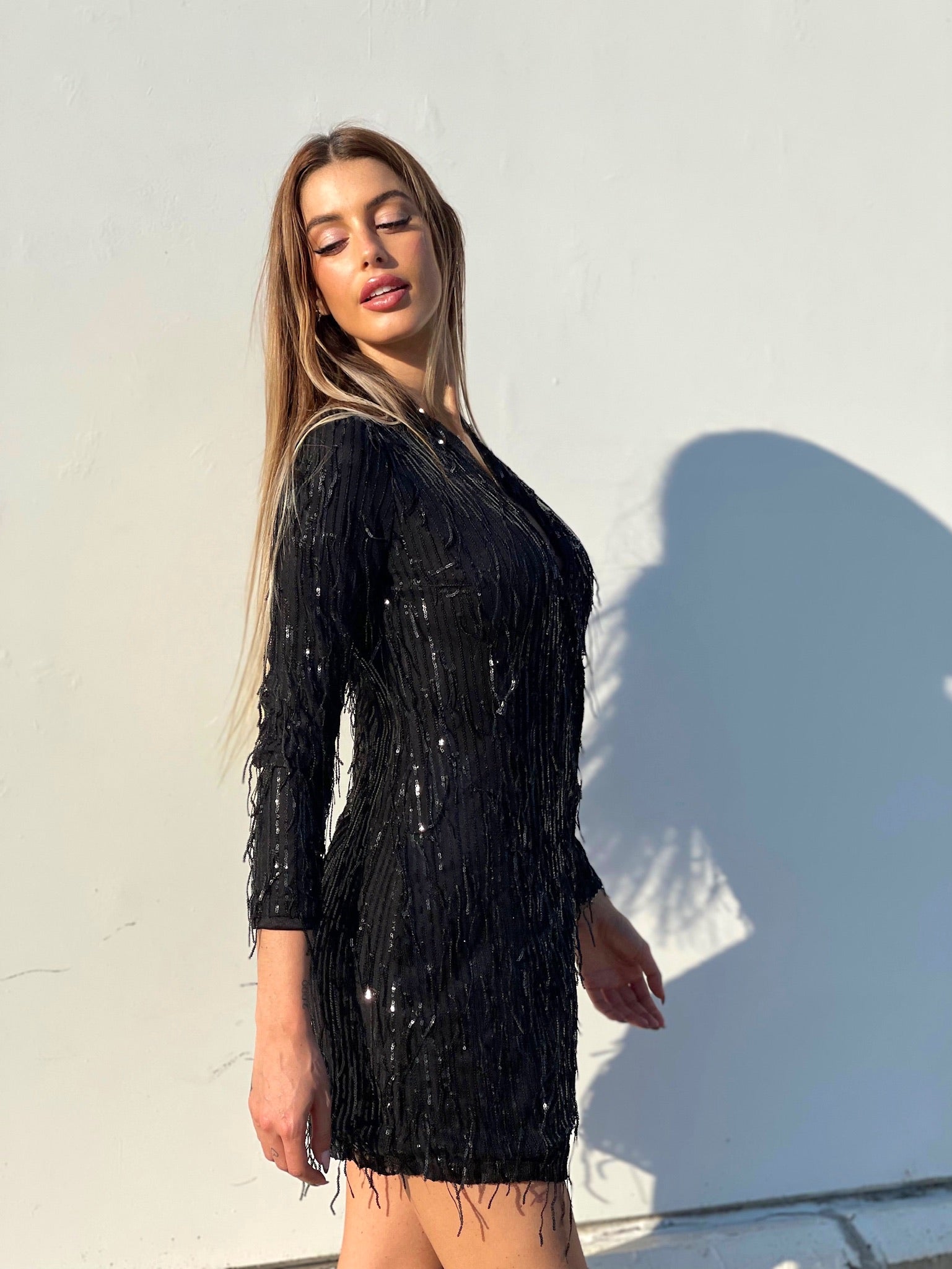 Abito nero frange in paillettes