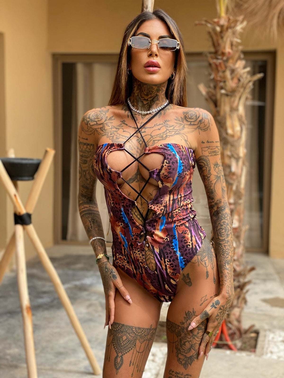Costume intero animalier violaceo
