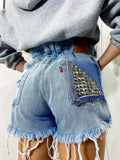 Short Levi’s Vintage bagno chiaro con borchie