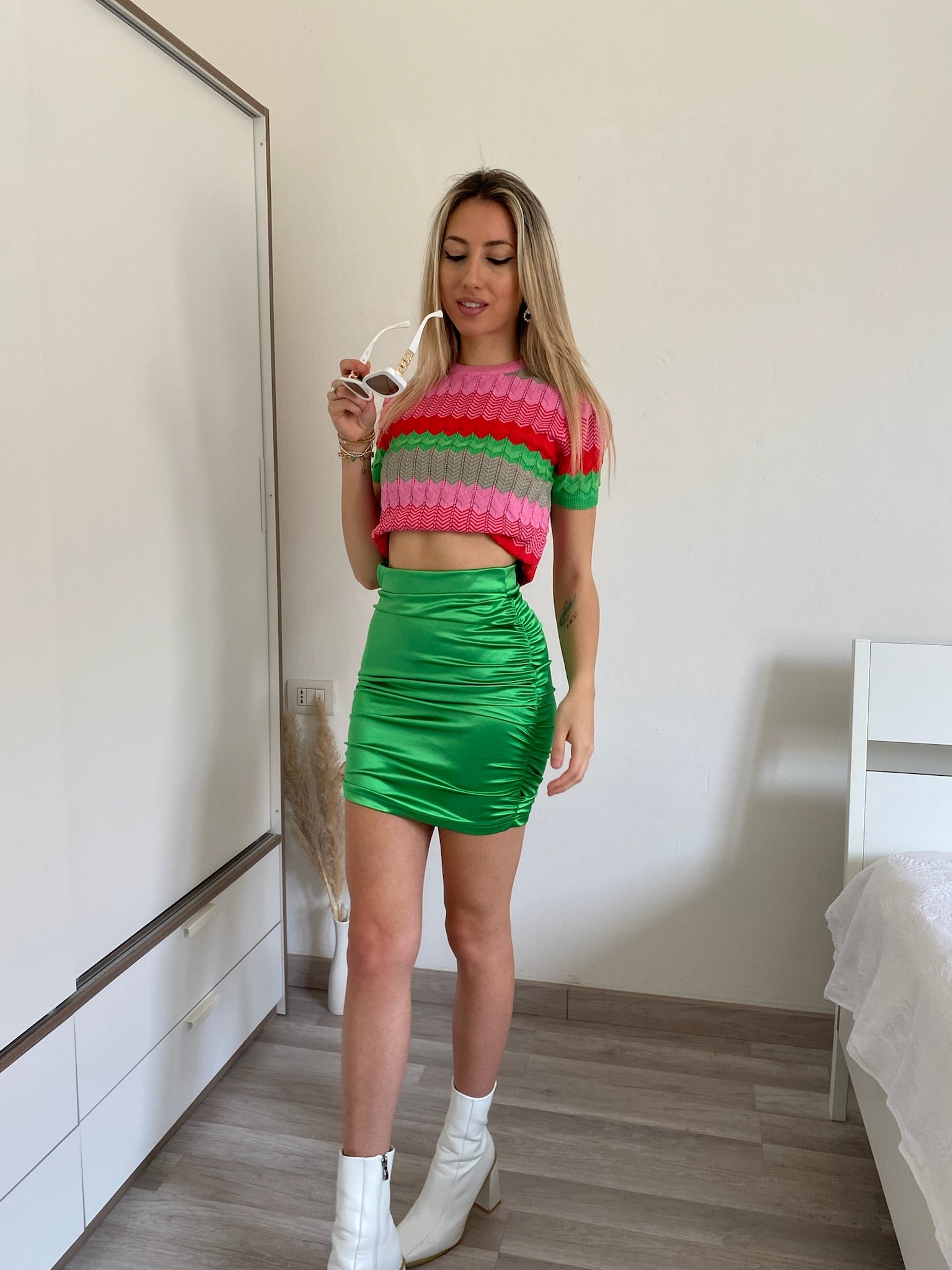 Maglia rosa e verde con cuori