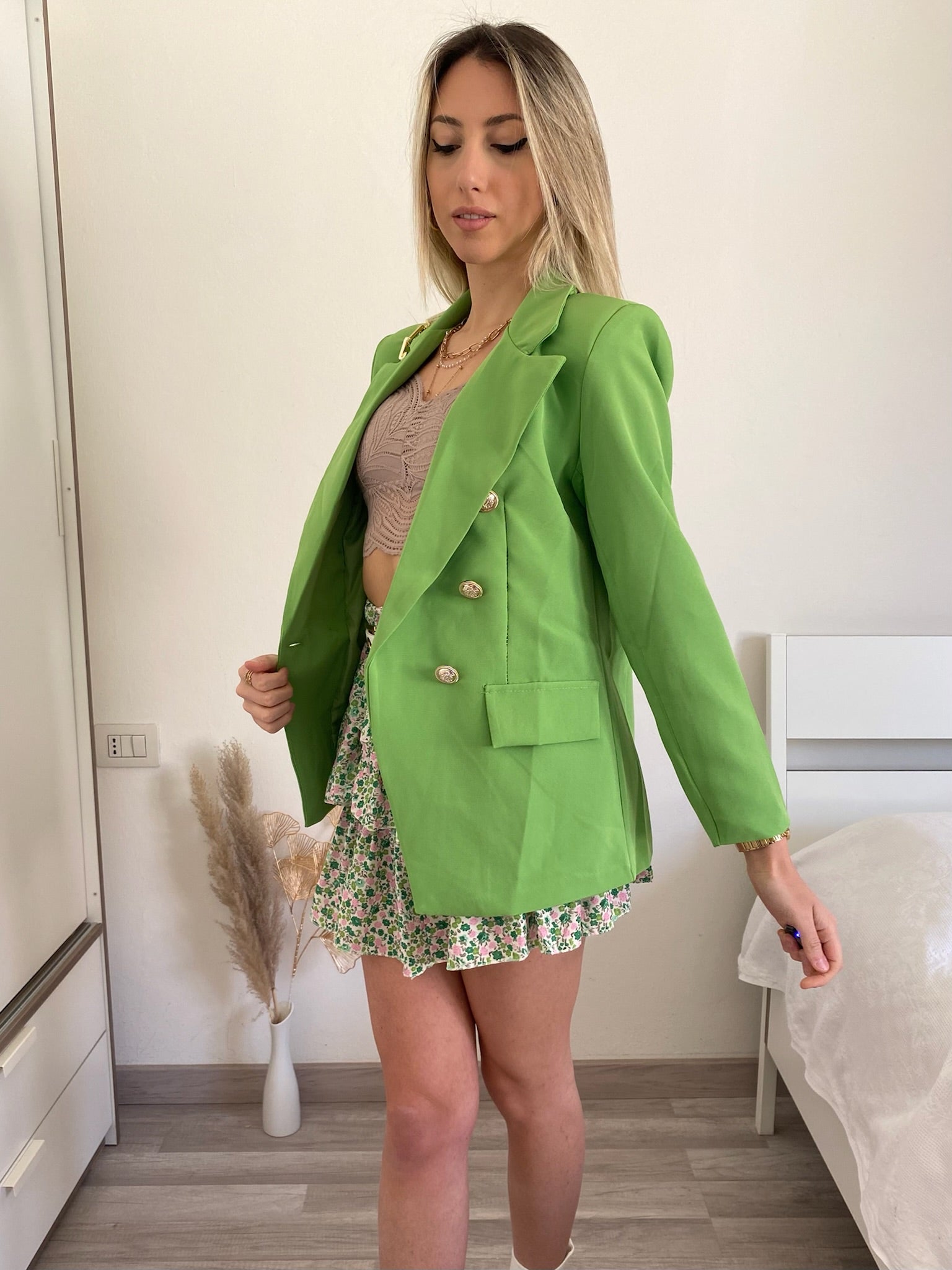 Giacca verde con bottoni oro