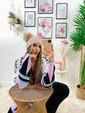 Cardigan rosa con frange e cinta