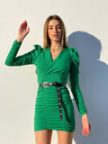 Abito verde con spalline e drappeggio