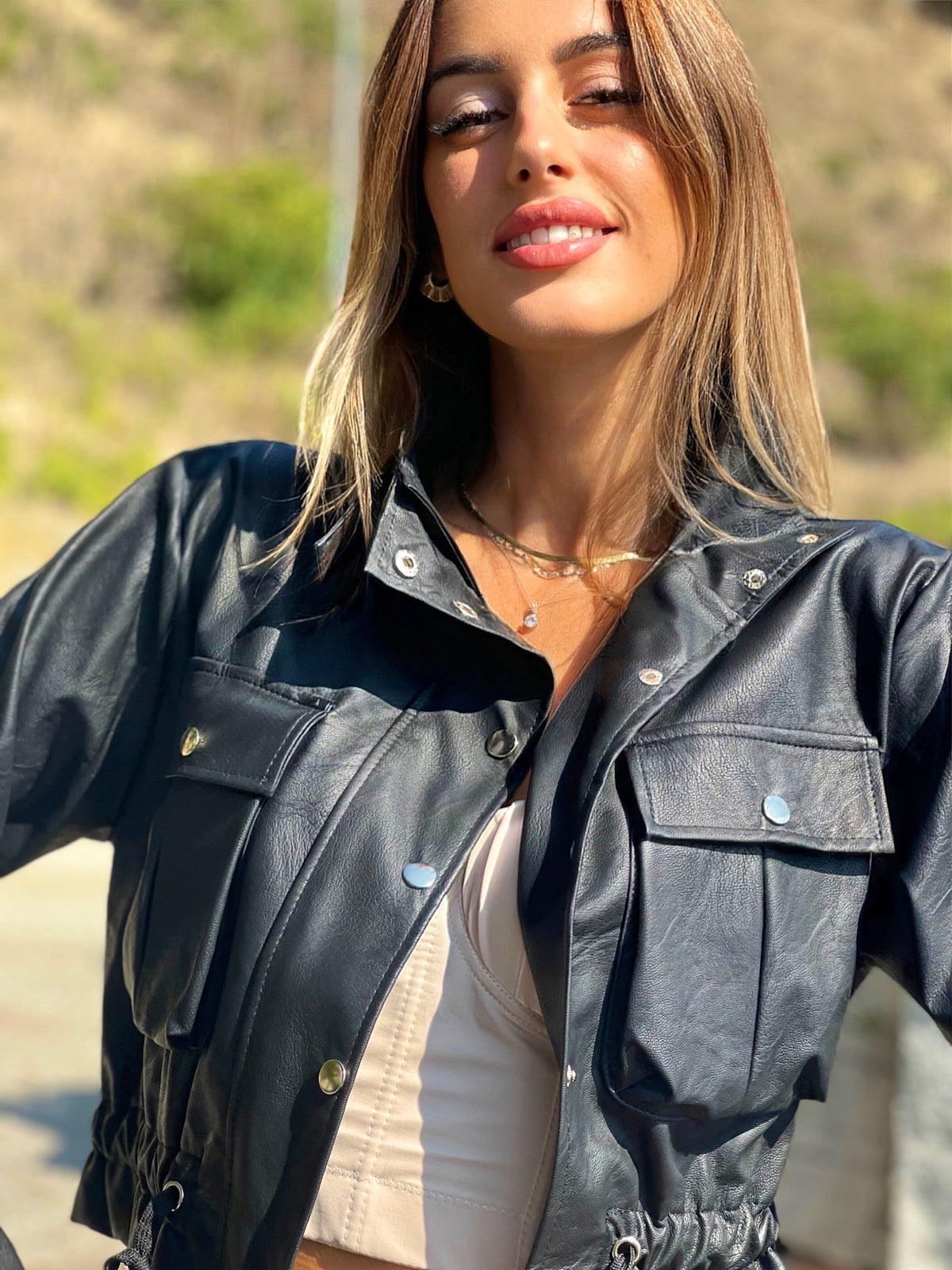 Giacca in eco-pelle con tasche