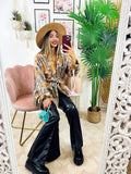 Cappotto con frange