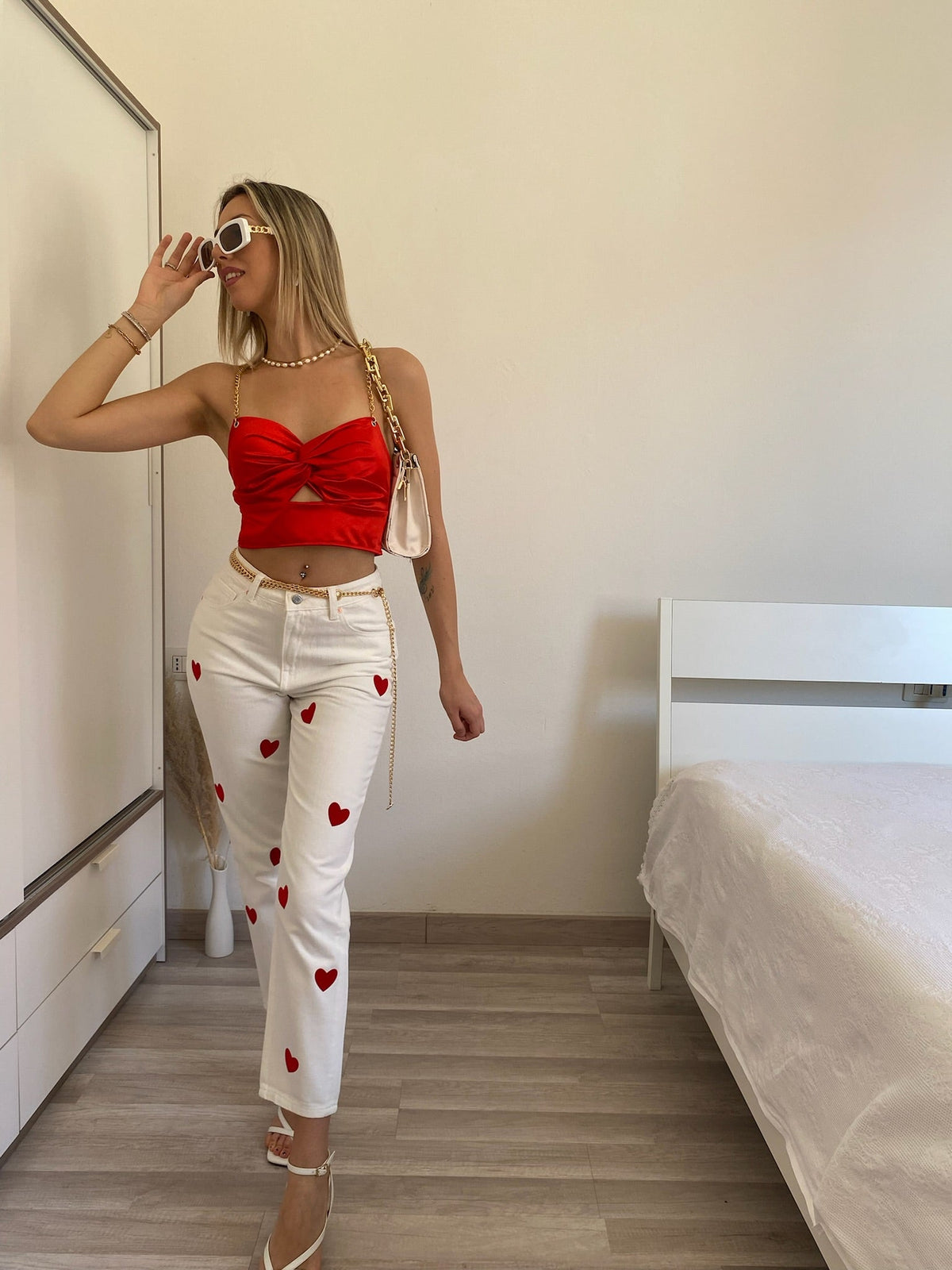 Jeans bianco cuori rossi