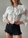 Camicia in pizzo bianca