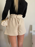 Short beige con cintura