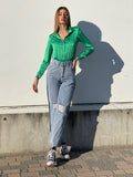 Jeans wide leg con strappi e dettaglio