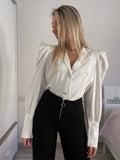 Camicia crop bianca con maniche a palloncino