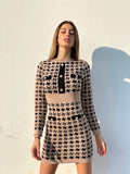 Abito in maglia nero Camel con bottoncini
