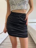 Gonna aderente nera con punto luce