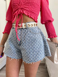 Short jeans a farfalla con strappini