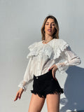 Short nero con borchie