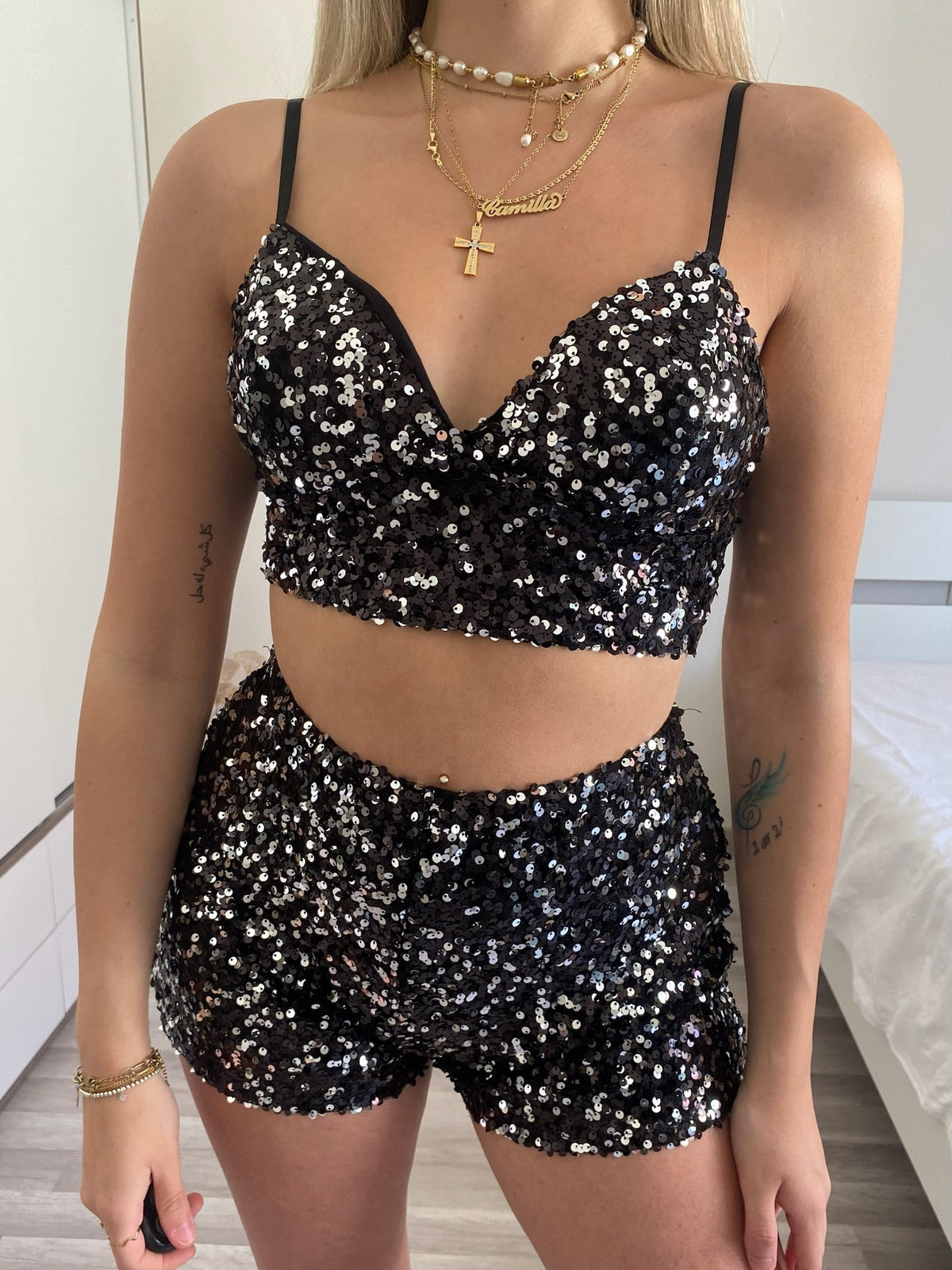 Completo top e short paillettes nero argento