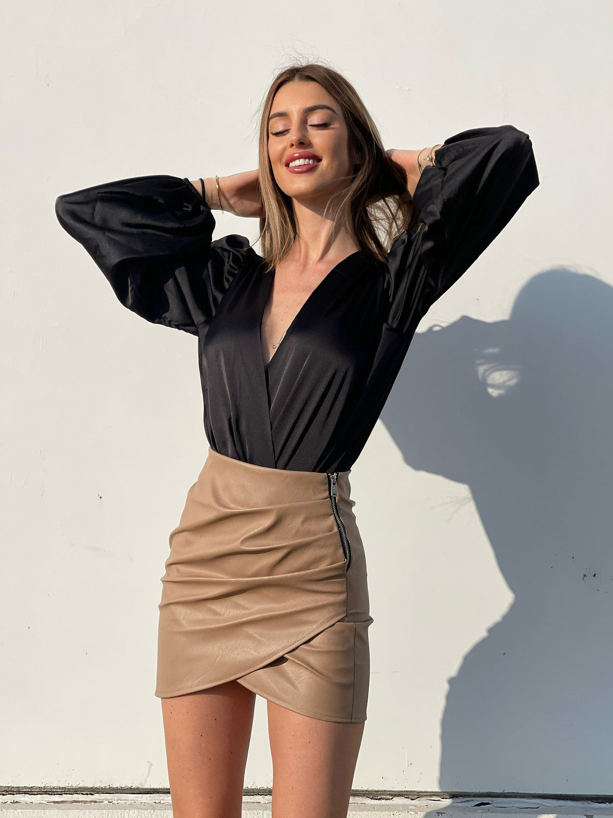 Gonna in ecopelle con zip laterale nude