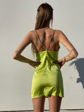 Abito in raso lime con dettaglio luce