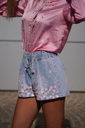 Short in jeans con fiori