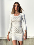 Abito in maglia con strass bianco
