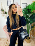Jogger gamba larga e croptop nera