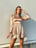 Abito in raso beige  con schiena aperta
