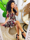 Abito a fiori bordeaux con scollo a barchetta