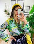 Camicia fiorata base verde