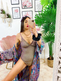 Body intero glitter con arricciature