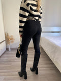 Jeans nero con lacci sul davanti