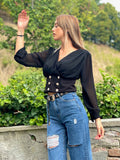 Blusa nera bottoncini oro